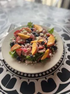 Summer peach strawberry blueberry salad with feta