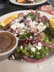 Mixed greens salad with beets and feta